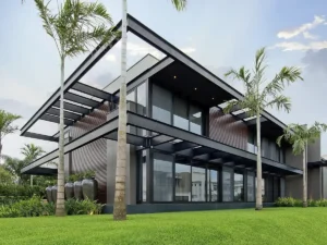 Fachada da Residência Iron, no Condomínio Premier em Jurerê Internacional, pela Progetta Studio